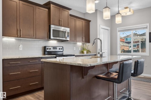 239 Ebbers Boulevard, Edmonton, AB - Indoor Photo Showing Kitchen With Upgraded Kitchen