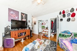 Hardwood-finish flooring throughout, complemented by light-toned wall finishes - 