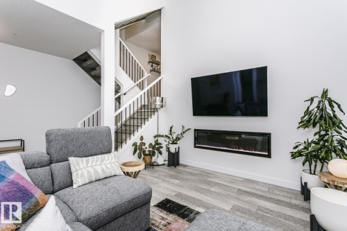 9737 101 Street, Edmonton, AB - Indoor Photo Showing Living Room With Fireplace