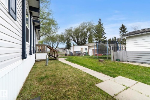 Exterior siding in a light tone with dark trim details - 49 Rim Road Nw, Edmonton, AB - Outdoor