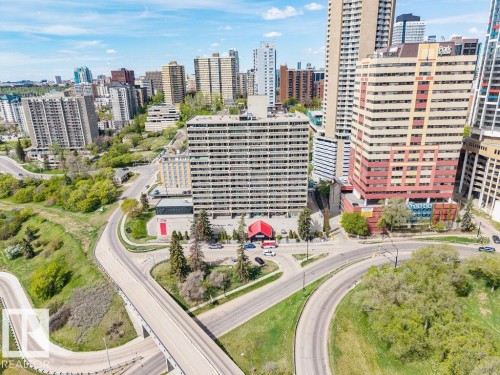 Aerial cityscape featuring multiple high-rise buildings and surrounding green spaces - 1208 9918 101 Street, Edmonton, AB - Outdoor With View