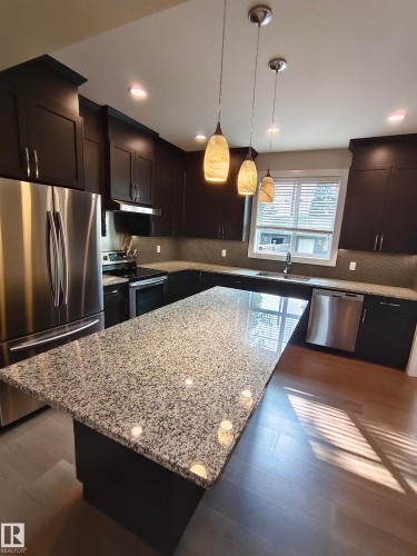 9527 75 Avenue, Edmonton, AB - Indoor Photo Showing Kitchen With Stainless Steel Kitchen With Upgraded Kitchen