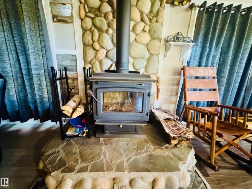401 60501 Rr 120, Rural St. Paul County, AB - Indoor With Fireplace