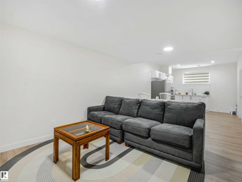 Image quality insufficient for description - 1518 Siskin Link Link, Edmonton, AB - Indoor Photo Showing Living Room