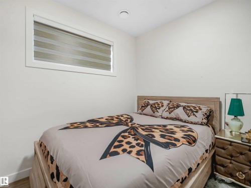 Image quality insufficient for description - 1518 Siskin Link Link, Edmonton, AB - Indoor Photo Showing Bedroom