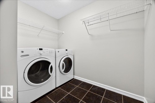 83 Becker Crescent, Fort Saskatchewan, AB - Indoor Photo Showing Laundry Room
