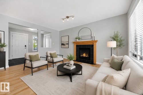 83 Becker Crescent, Fort Saskatchewan, AB - Indoor Photo Showing Living Room With Fireplace