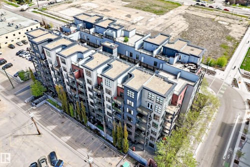 Modern multi-story building featuring multiple balconies and rooftop terraces - 316 10518 113 Street, Edmonton, AB - Outdoor
