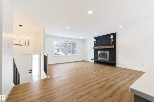 3 Linthorpe Road, Spruce Grove, AB - Indoor Photo Showing Living Room With Fireplace