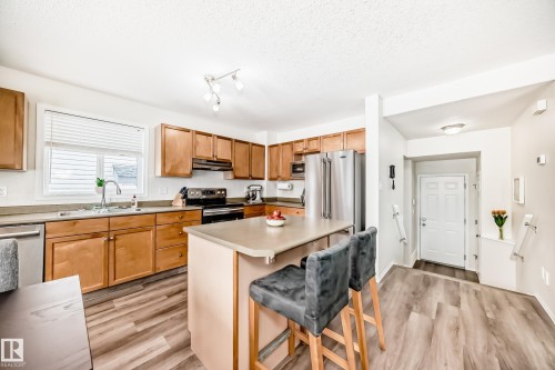3132 33 Avenue, Edmonton, AB - Indoor Photo Showing Kitchen With Stainless Steel Kitchen With Double Sink