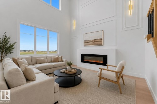 12 Cobblestone Gate, Spruce Grove, AB - Indoor Photo Showing Living Room With Fireplace