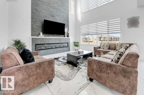 424 33 Avenue, Edmonton, AB - Indoor Photo Showing Living Room With Fireplace