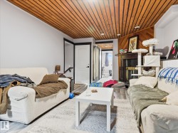 Wood-finish plank ceiling with recessed lighting - 