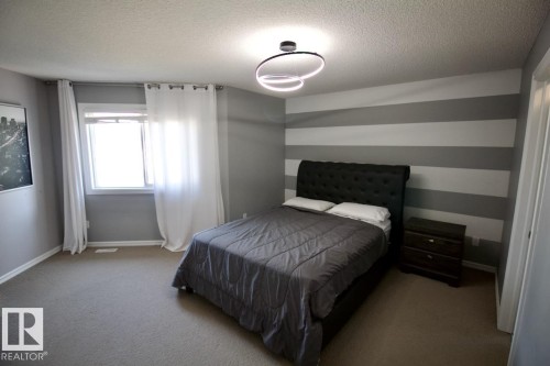 98 Walters Place, Leduc, AB - Indoor Photo Showing Bedroom