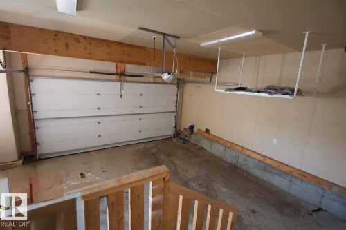 98 Walters Place, Leduc, AB - Indoor Photo Showing Garage