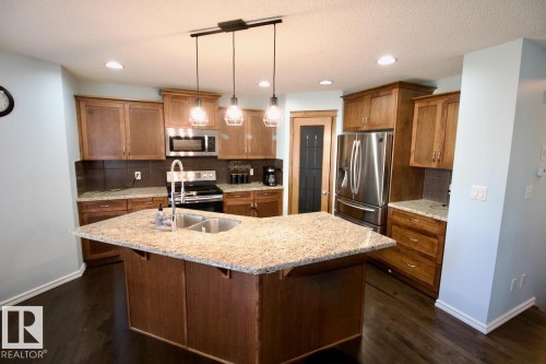 98 Walters Place, Leduc, AB - Indoor Photo Showing Kitchen With Double Sink With Upgraded Kitchen