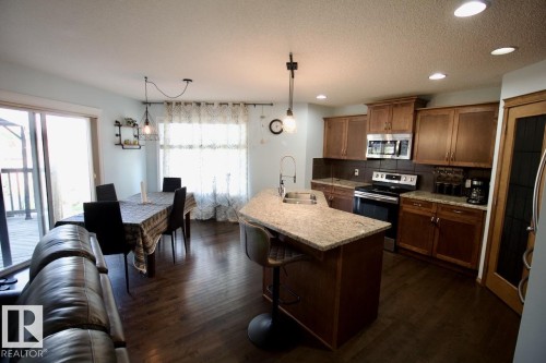 98 Walters Place, Leduc, AB - Indoor Photo Showing Kitchen With Double Sink