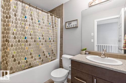 Upstairs 4 Piece Bathroom featuring Shower Tub Combo. - 20023 17A Avenue, Edmonton, AB - Indoor Photo Showing Bathroom