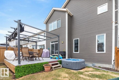 Fully fenced South East Facing backyard featuring Composite Deck - 20023 17A Avenue, Edmonton, AB - Outdoor With Deck Patio Veranda