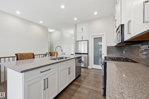 1 103 Allard Link, Edmonton, AB - Indoor Photo Showing Kitchen With Double Sink With Upgraded Kitchen