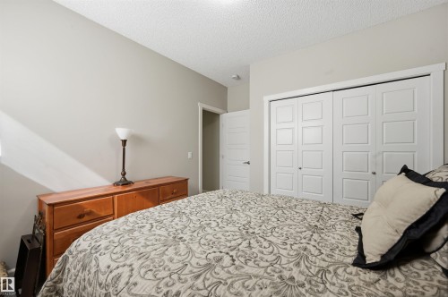 1 103 Allard Link, Edmonton, AB - Indoor Photo Showing Bedroom