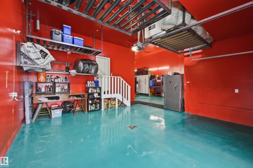 Lots of overhead storage - 1 103 Allard Link, Edmonton, AB - Indoor Photo Showing Other Room