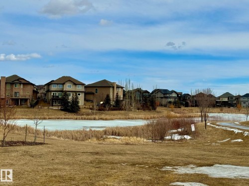 Park pond is just a block away - 1 103 Allard Link, Edmonton, AB - Outdoor With View