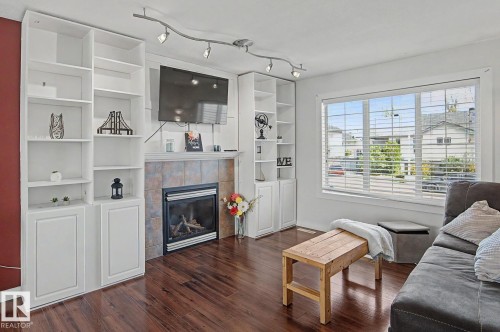 7565 165A Avenue, Edmonton, AB - Indoor Photo Showing Living Room With Fireplace