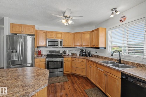 7565 165A Avenue, Edmonton, AB - Indoor Photo Showing Kitchen With Double Sink