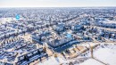 Aerial perspective showcasing a residential area with diverse property types, including multi-story buildings and townhome-style residences - 213 5065 31 Avenue, Edmonton, AB  - Outdoor With View 