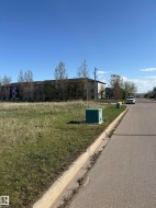 Expansive grassy lot with curbside access - 