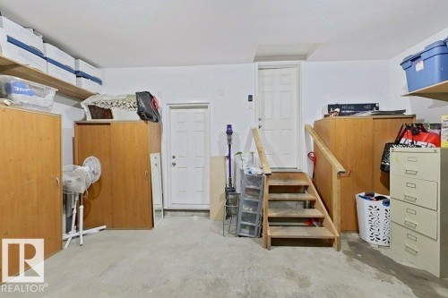 Concrete flooring with white painted walls - 1206 Mckinney Court, Edmonton, AB - Indoor