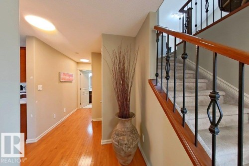 Hardwood flooring throughout the hallway - 1206 Mckinney Court, Edmonton, AB - Indoor Photo Showing Other Room