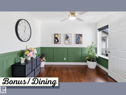 This versatile room features rich wood flooring, a ceiling fan with integrated lighting, and a window with a roller blind - 3243 26 Street, Edmonton, AB - Indoor Photo Showing Other Room