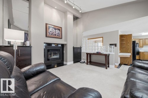 38 West Point Wynd, Edmonton, AB - Indoor Photo Showing Living Room With Fireplace