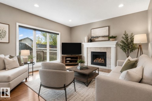 9 Woodbridge Link, Fort Saskatchewan, AB - Indoor Photo Showing Living Room With Fireplace