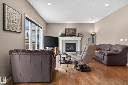 9 Woodbridge Link, Fort Saskatchewan, AB - Indoor Photo Showing Living Room With Fireplace