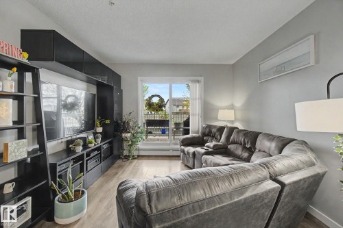 129 503 Albany Way, Edmonton, AB - Indoor Photo Showing Living Room