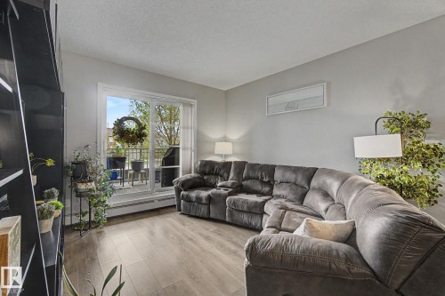 129 503 Albany Way, Edmonton, AB - Indoor Photo Showing Living Room