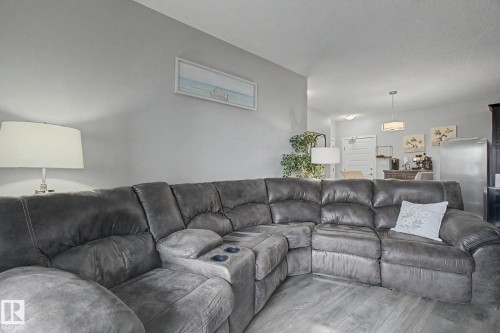 129 503 Albany Way, Edmonton, AB - Indoor Photo Showing Living Room