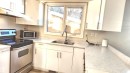 4709 106 Street, Edmonton, AB  - Indoor Photo Showing Kitchen With Double Sink 