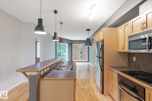 511 10503 98 Avenue, Edmonton, AB - Indoor Photo Showing Kitchen With Double Sink