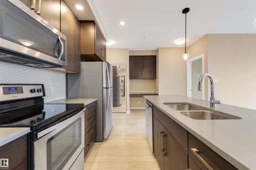 434 1008 Rosenthal Boulevard, Edmonton, AB - Indoor Photo Showing Kitchen With Stainless Steel Kitchen With Double Sink