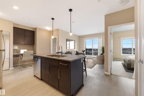 434 1008 Rosenthal Boulevard, Edmonton, AB - Indoor Photo Showing Kitchen With Stainless Steel Kitchen With Double Sink