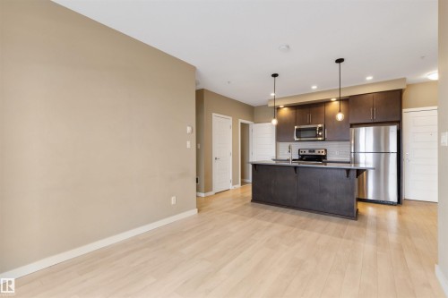434 1008 Rosenthal Boulevard, Edmonton, AB - Indoor Photo Showing Kitchen With Stainless Steel Kitchen