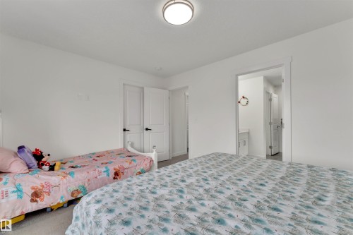 Interior room featuring light-colored walls and carpet flooring - 22534 98A Avenue, Edmonton, AB - Indoor Photo Showing Bedroom