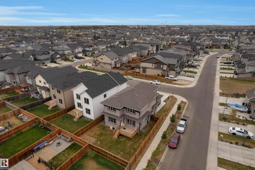 Contemporary residential property featuring a multi-level design and a dark shingle roof - 22534 98A Avenue, Edmonton, AB - Outdoor With View