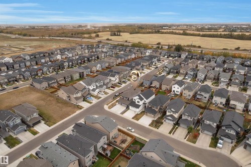 Aerial perspective showcasing a residential development with multiple detached homes - 22534 98A Avenue, Edmonton, AB - Outdoor With View