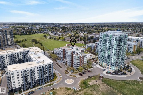 Contemporary building featuring a flat roof and multiple levels of balconies - 808 2612 109 Street, Edmonton, AB - Outdoor With View