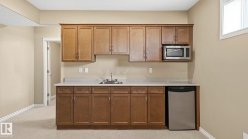 28 1251 Rutherford Road, Edmonton, AB - Indoor Photo Showing Kitchen With Double Sink